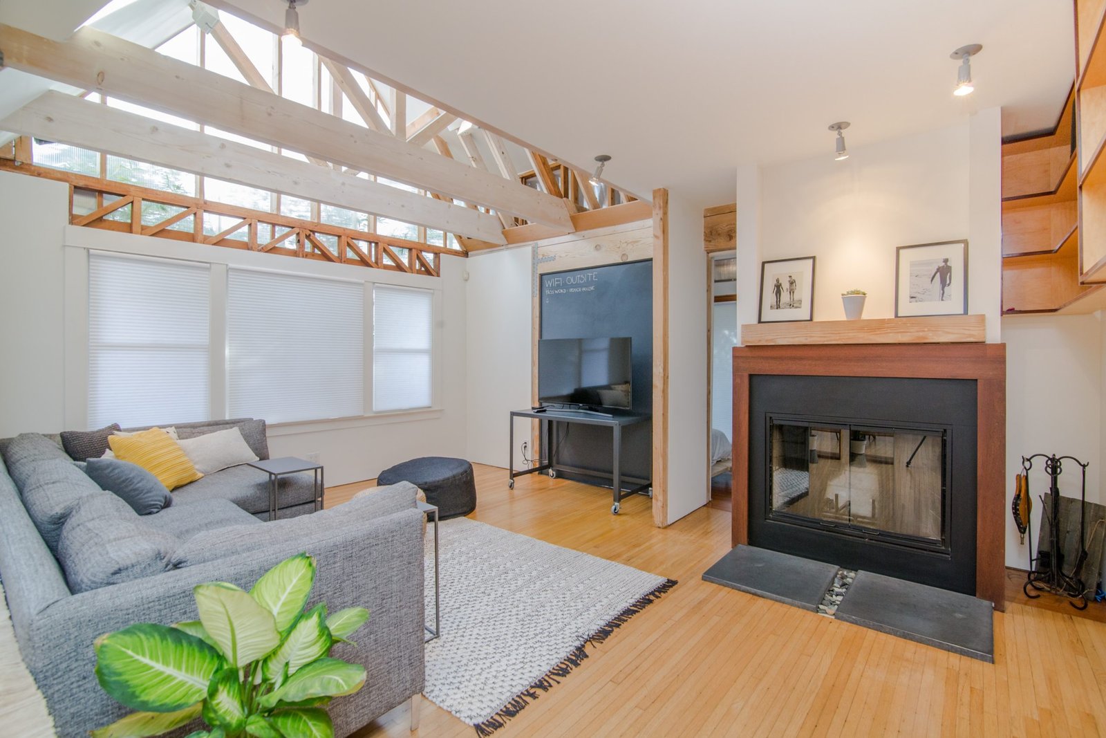 Finished basement rec room with a fireplace in a Wauwatosa, Wisconsin home