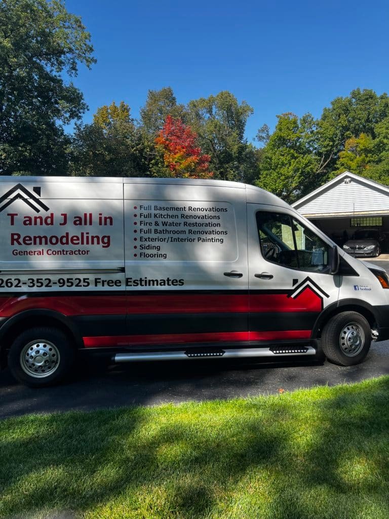 T and J All In Remodeling service van parked at a job site in Waukesha County, Wisconsin