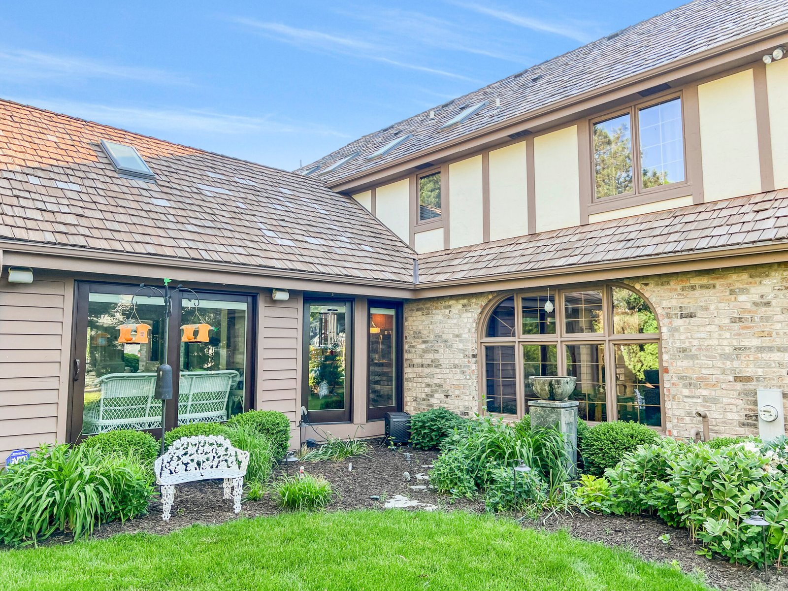 A 1950s Waukesha County ranch home exterior facing a tear-down versus remodel decision