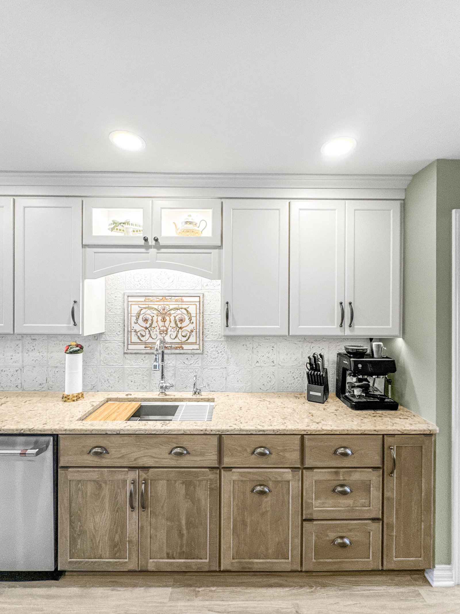 White Uppers And Stained Lower Cabinets Kitchen Remodel in Muskego, WI by T And J All In Remodeling project photo