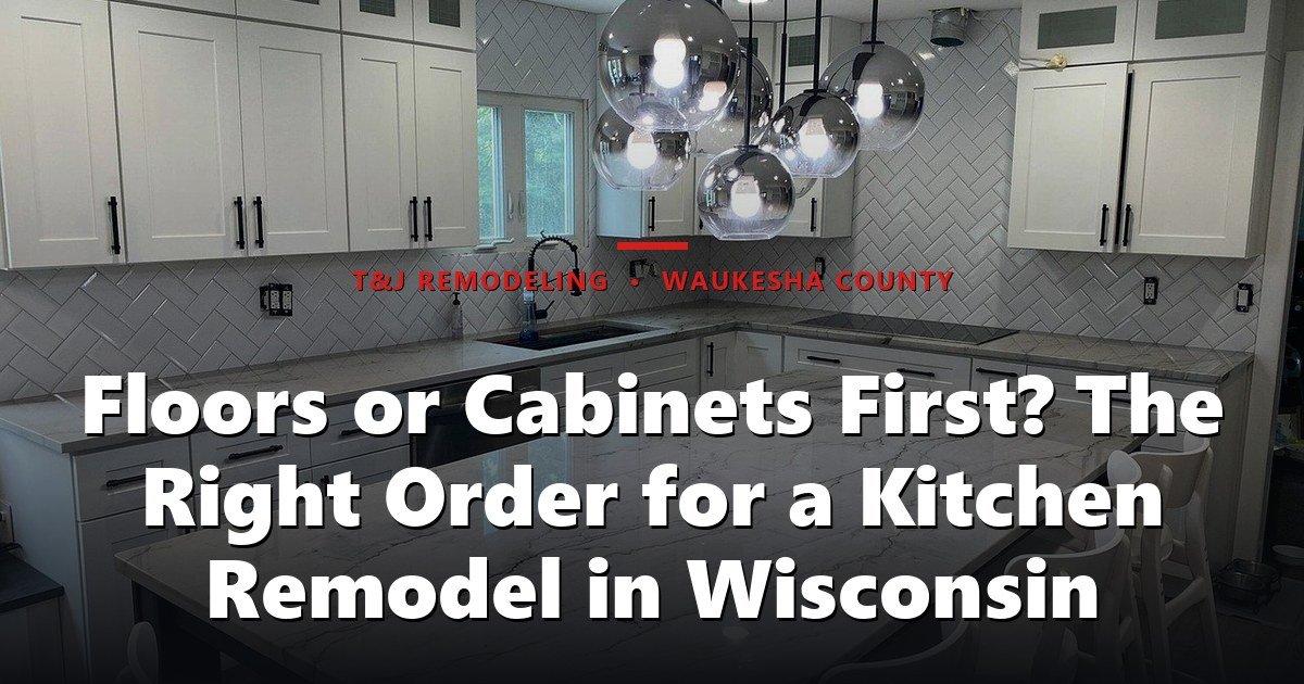 Floors or Cabinets First? The Right Order for a Kitchen Remodel in Wisconsin - A modern, finished kitchen with white cabinetry, marble countertops, herringbone
